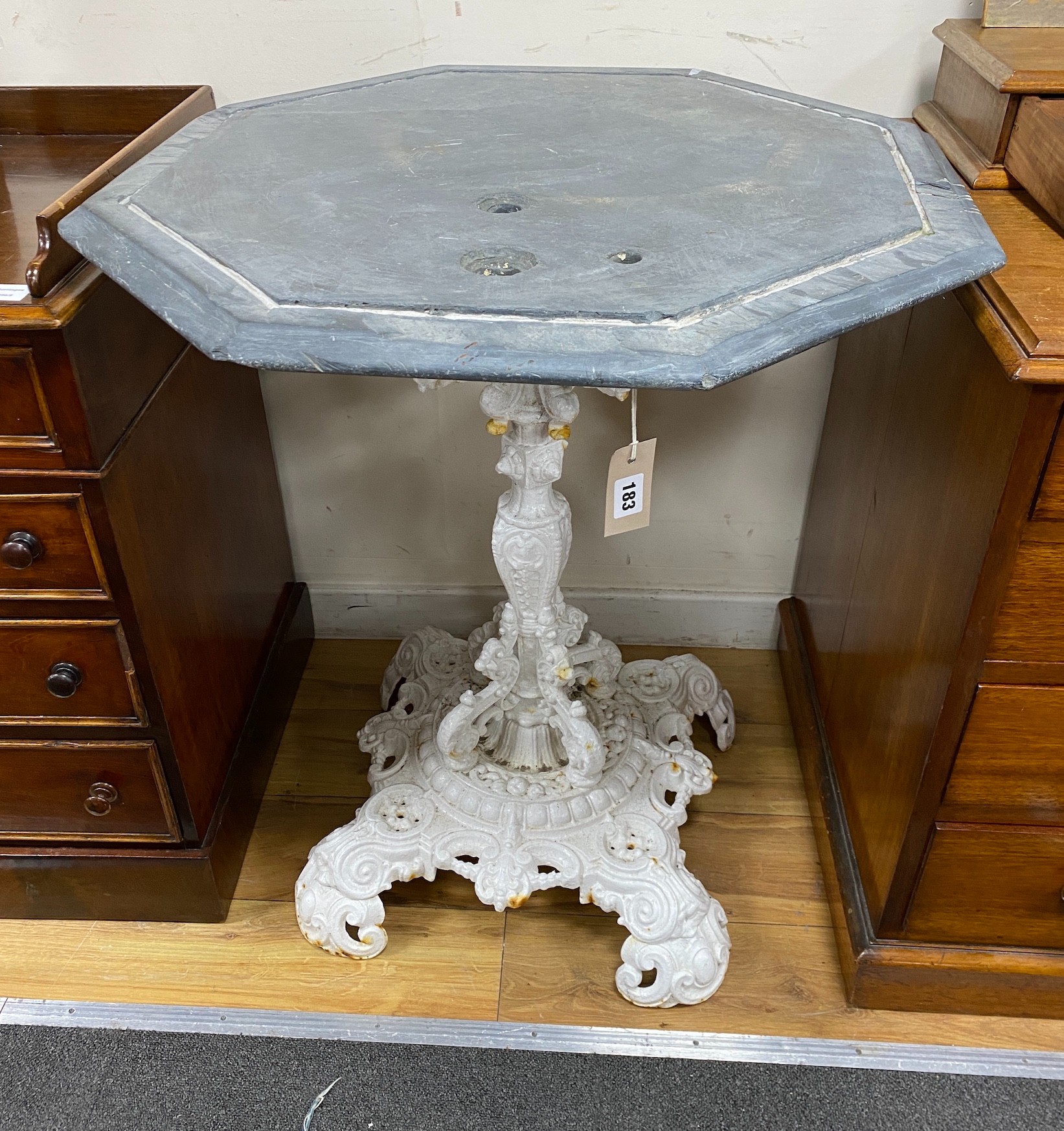 A Victorian octagonal cast iron slate top table, width 70cm, height 81cm